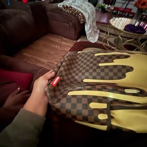Sprayground Brown and Yellow Drip Checkered Bag
